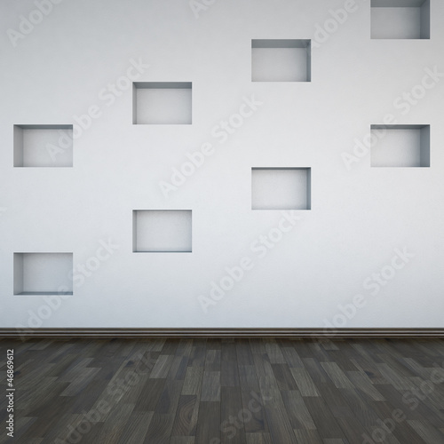 A wall with empty shelves