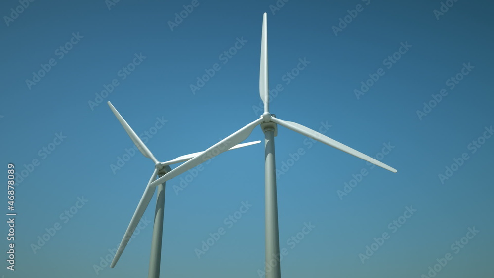 Turbines in a windfarm generating alternative energy. Turbines in a windfarm generating alternative energy.