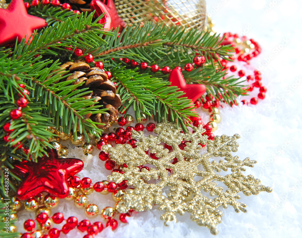 Christmas decorations of bauble are with the branches of fir on