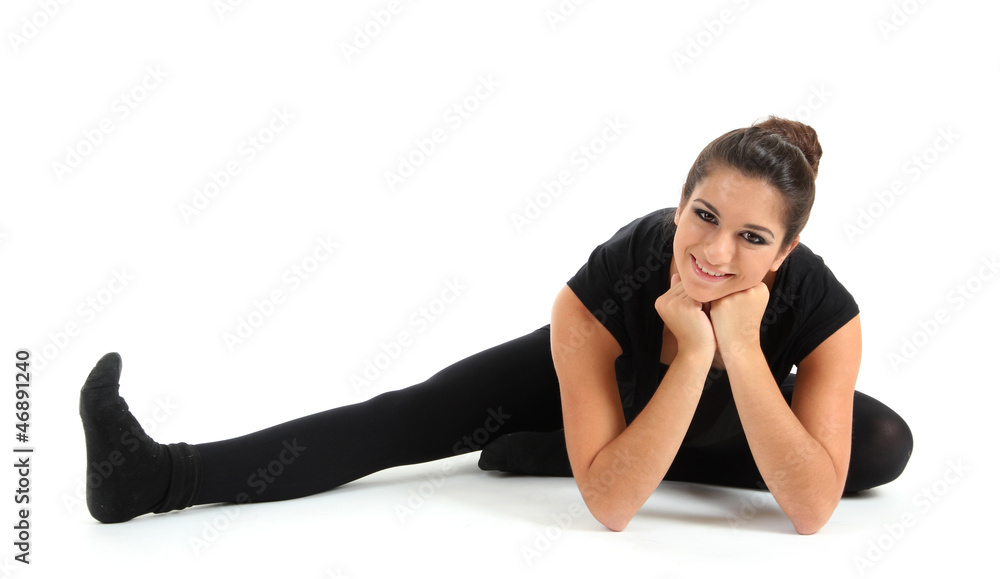 Fototapeta premium young beautiful brunette warming-up isolated on white