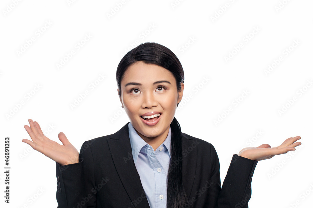 Asian businesswoman shrugging her shoulders Asian businesswoman shrugging her shoulders