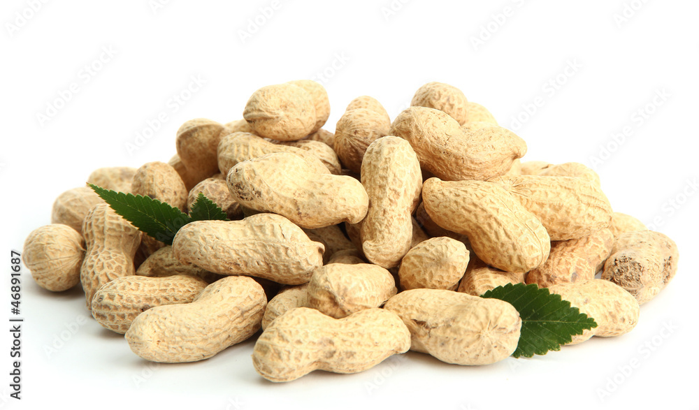 tasty peanuts with leaves, isolated on white tasty peanuts with leaves, isolated on white