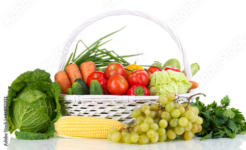 Composition with vegetables and fruits in wicker basket