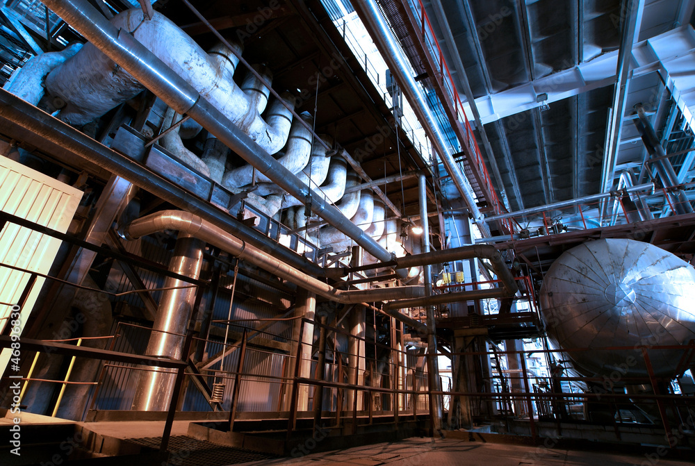 Industrial zone, Steel pipelines and cables in blue tones Industrial zone, Steel pipelines and cables in blue tones