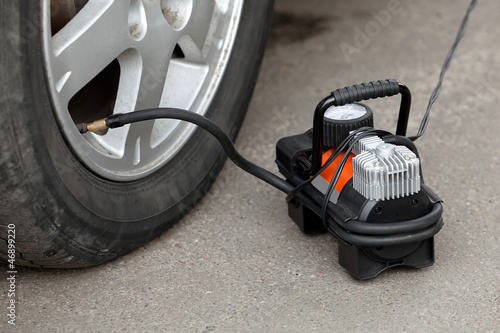air compressor for car  wheels in working position