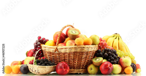 Assortment of exotic fruits and berries in baskets isolated
