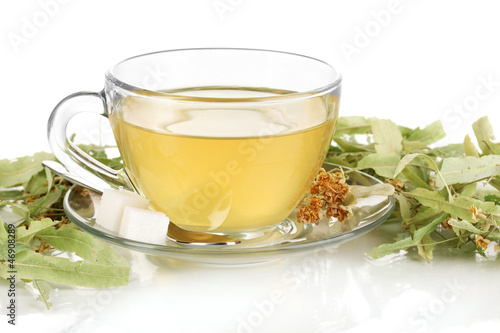 Glass cup of tea with linden isolated on white