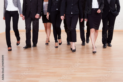 Group of business executives approaching