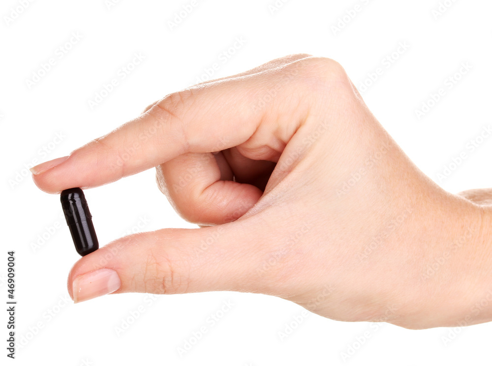 activated carbon in hand isolated on white activated carbon in hand isolated on white