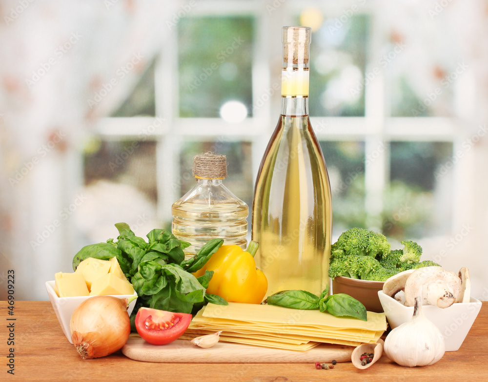 Vegetarian lasagna ingredients on bright background Vegetarian lasagna ingredients on bright background