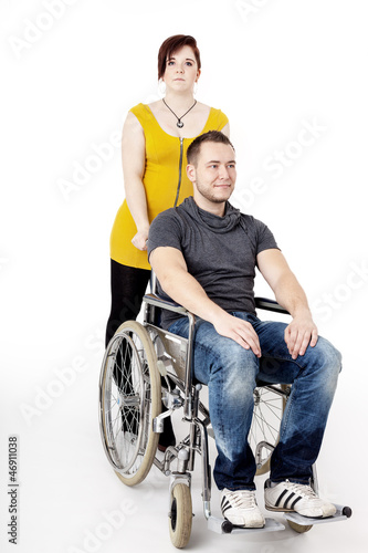Man in wheelchair being pushed by woman © Edler von Rabenstein
