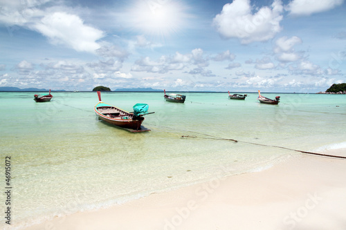Fototapeta Naklejka Na Ścianę i Meble -  Long tail boats near the sand beach at Koh Lipe, Thailand