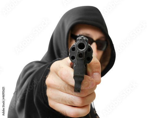 Принти на полотні man  shoots a gun, gangster, focus on the gun, isolated on white