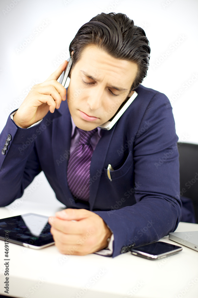 Sad depressed businessman too much work Sad depressed businessman too much work