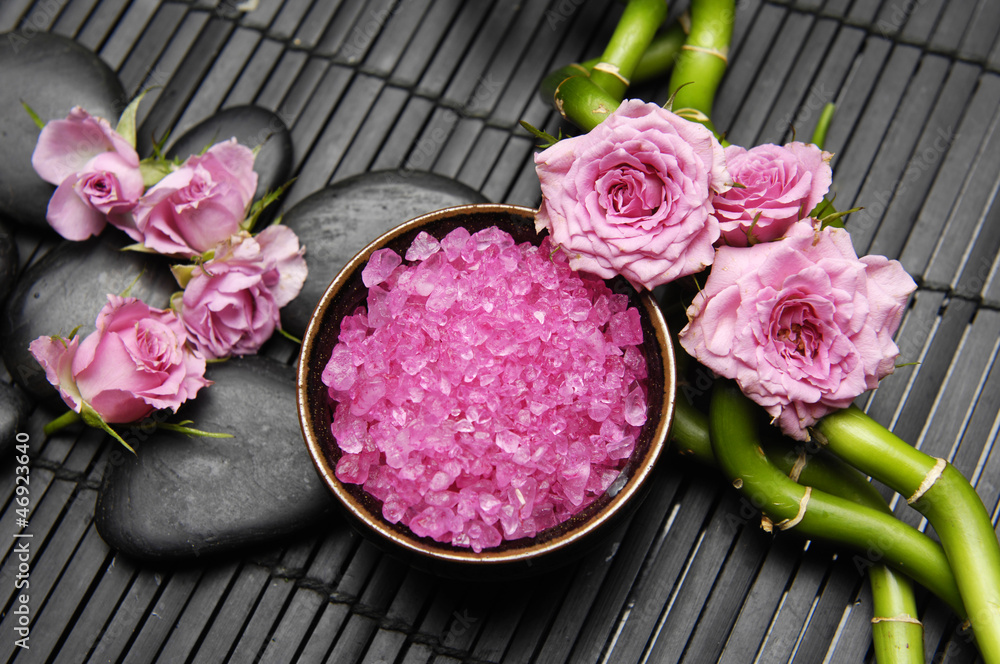 pink rose with grove and salt in bowl on mat pink rose with grove and salt in bowl on mat