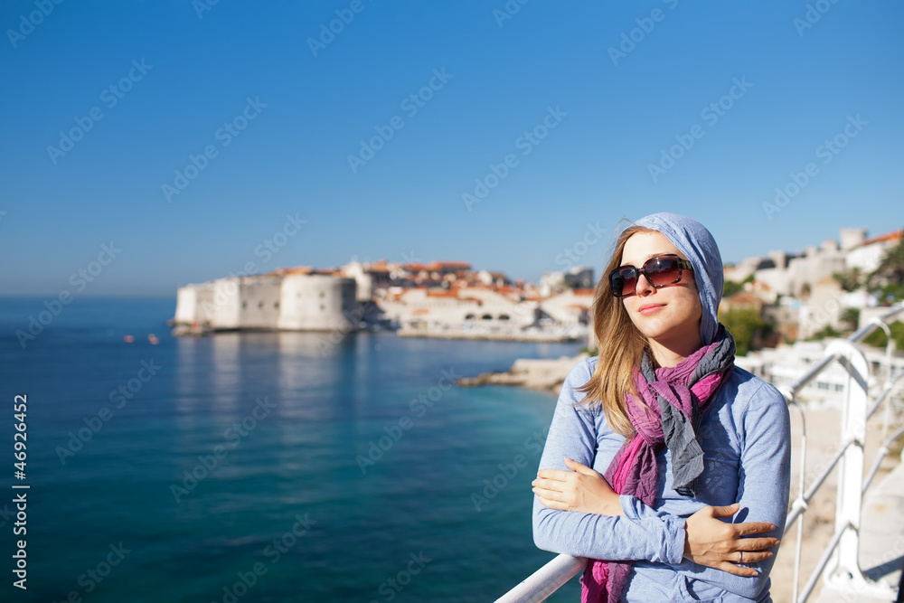 Tourist woman against old town of Dubrovnik