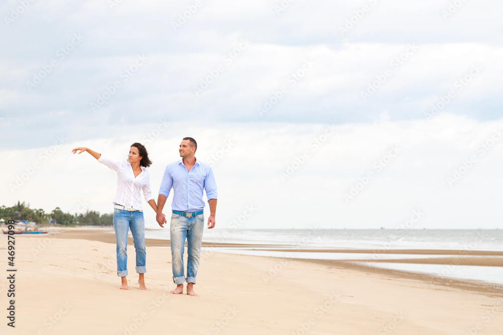 Portrait of a happy couple at the beach Portrait of a happy couple at the beach