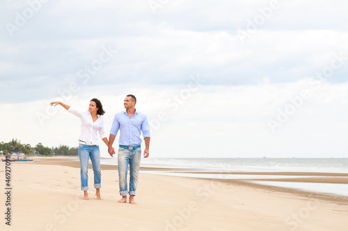 Portrait of a happy couple at the beach