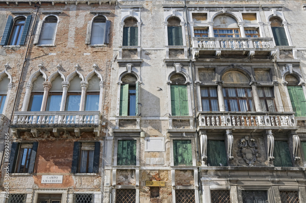 Old building facade in Venice, Italy