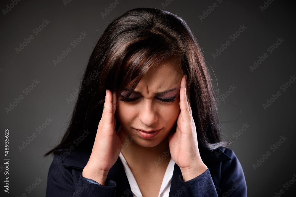 Young businesswoman with headache Young businesswoman with headache