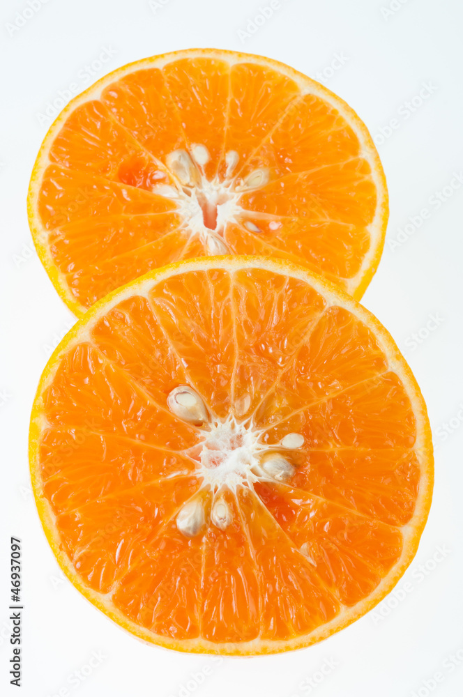 slices of orange on white background slices of orange on white background