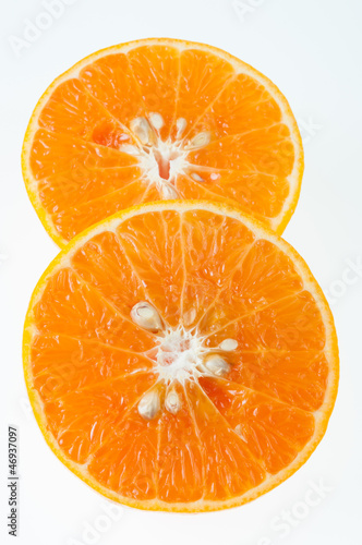 slices of orange on white background