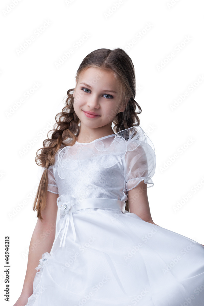 Pretty small kid portrait in white dress isolated Pretty small kid portrait in white dress isolated