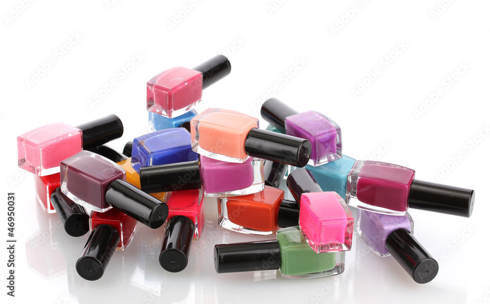 Obraz premium Group of bright nail polishes isolated on white