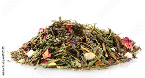 aromatic green dry tea with fruits and petals, isolated on