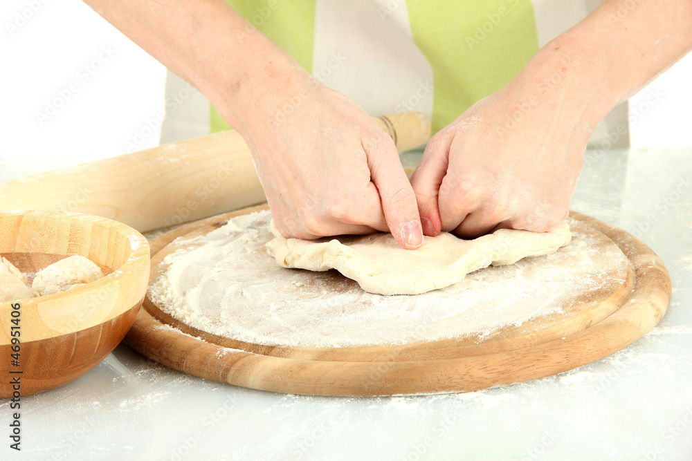 Preparing pizza dough isolated on white Preparing pizza dough isolated on white
