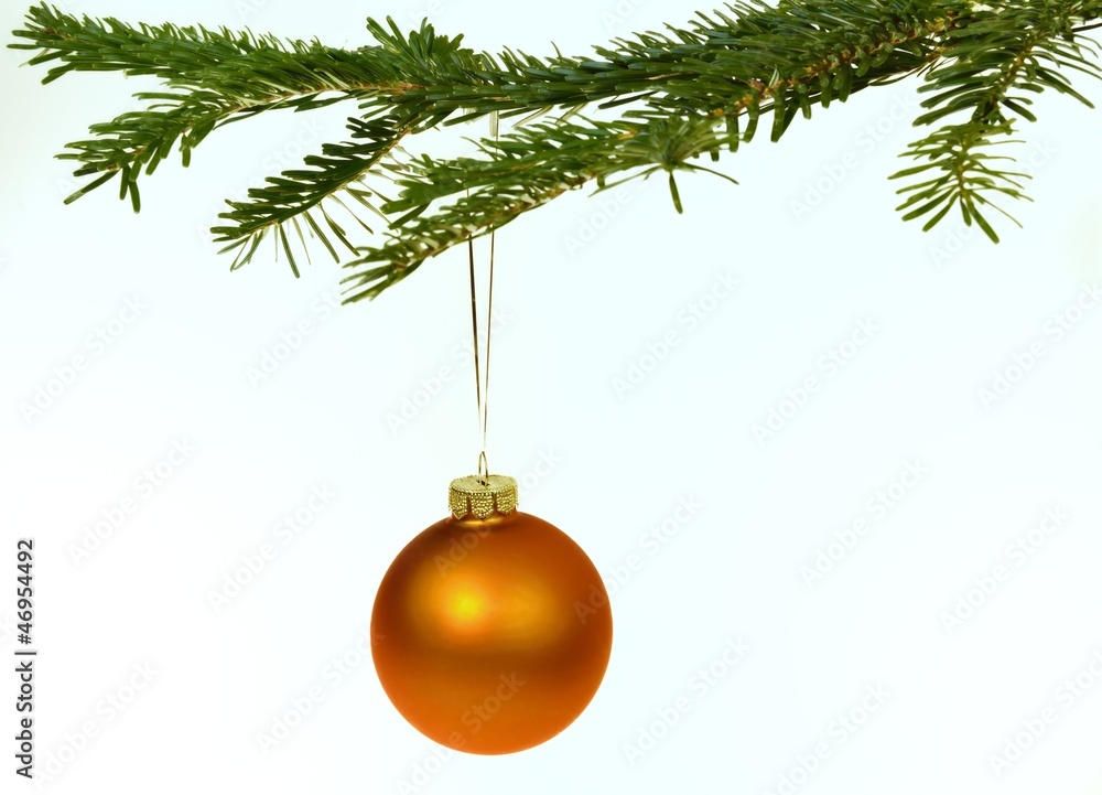 Orange Christmas decorations on a branch