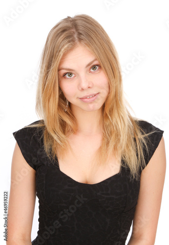 Portrait of a woman in a black dress on a white background. © oshepkov