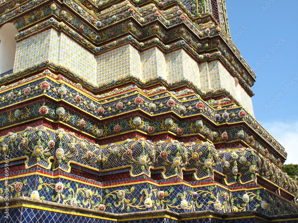 detail of traditional Thai pagoda with colorful glass clay tiles
