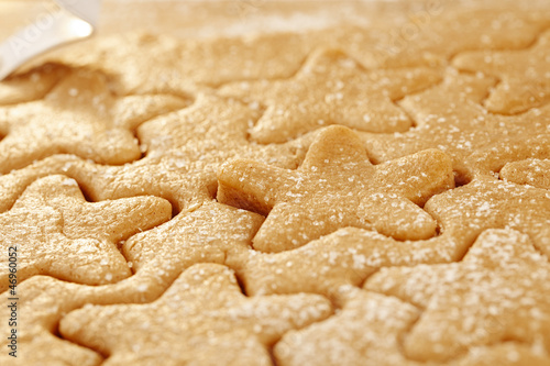 gingerbread star cookie cuts dough