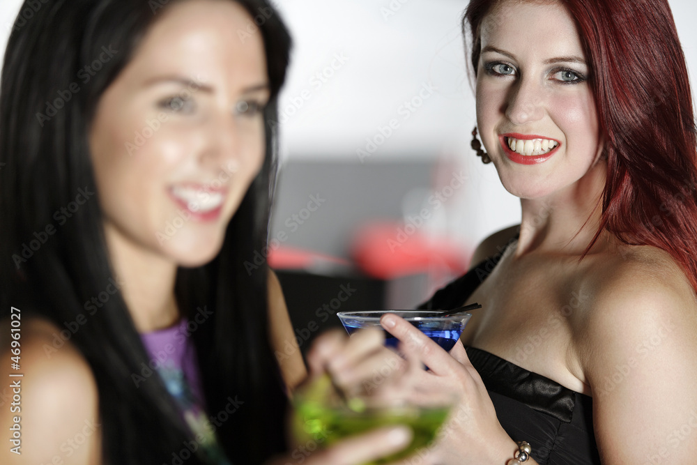 Two friends in a nightclub Two friends in a nightclub