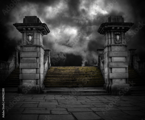 Spooky old sandstone graveyard entrance photo