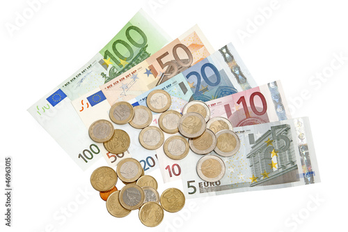 Euro banknotes and coins isolated on white background