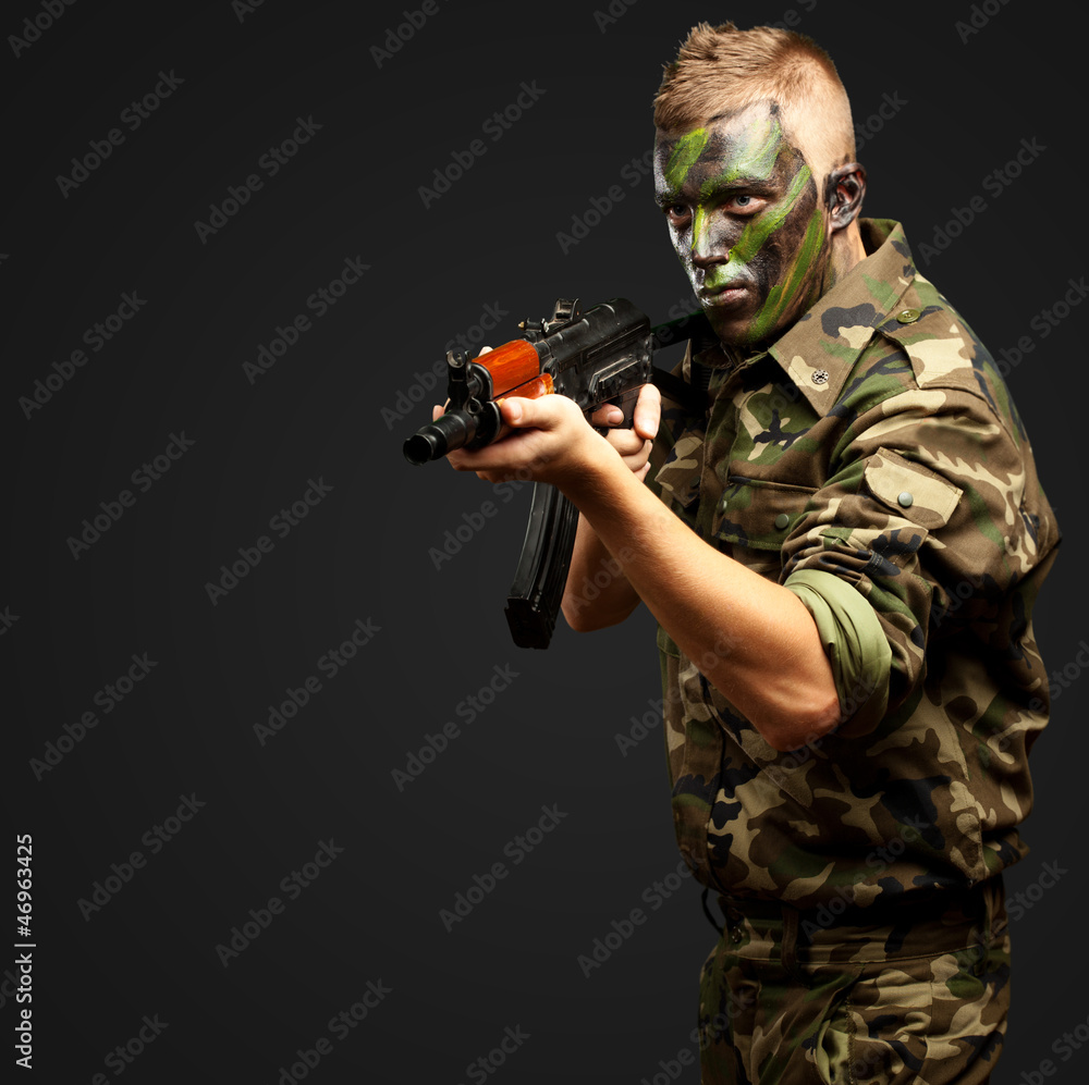 Portrait Of A Soldier Aiming With Gun Portrait Of A Soldier Aiming With Gun
