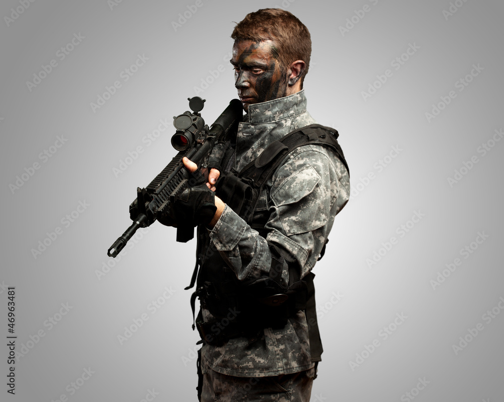Portrait Of Soldier Holding Gun Portrait Of Soldier Holding Gun