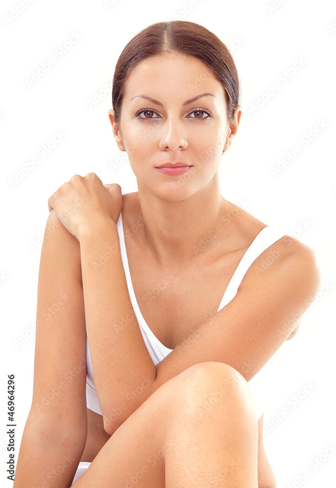Beautiful female body in white underwear, studio shot Beautiful female body in white underwear, studio shot