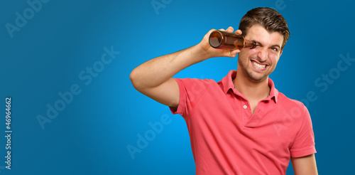Εκτύπωση καμβά man looking inside an empty bottle