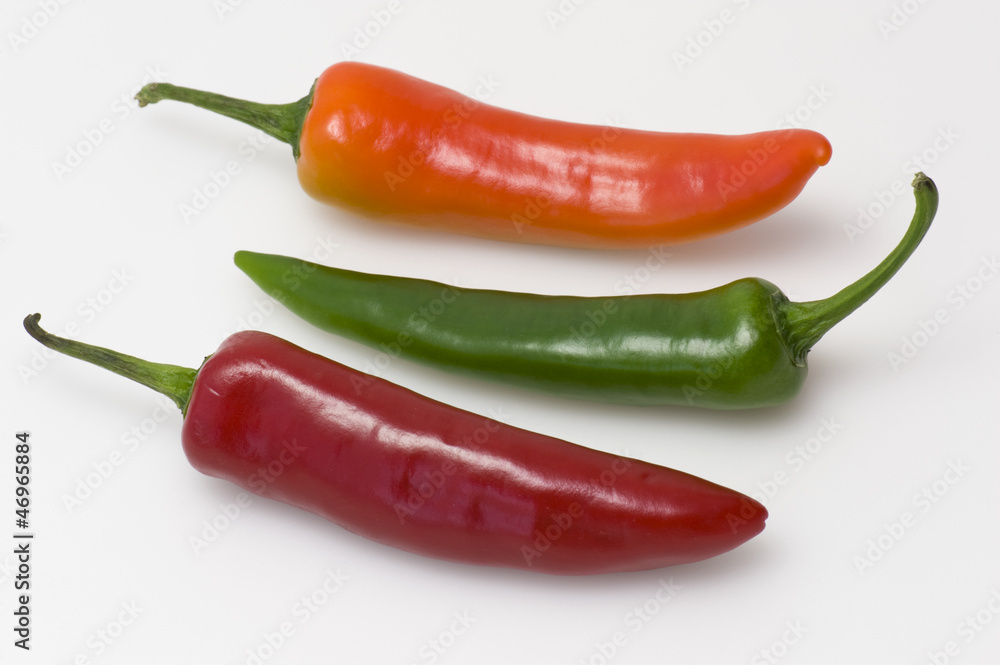 Three colourful peppers