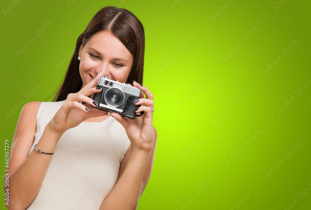 Young Woman Holding Camera