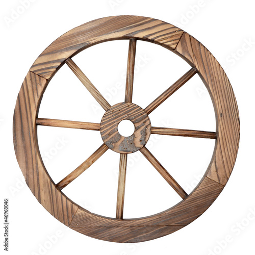 Old wooden wagon wheel on white