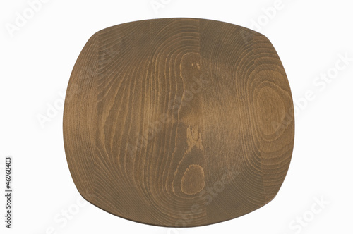 Wooden plate on white background