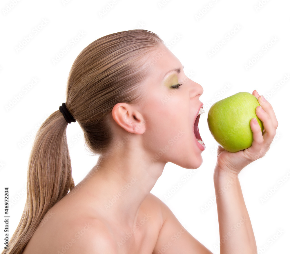 Attractive Young Blond Woman Eat Green Apple On A White Attractive Young Blond Woman Eat Green Apple On A White