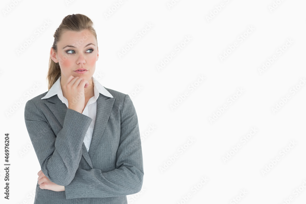 Businesswoman looking thoughtfully away Businesswoman looking thoughtfully away