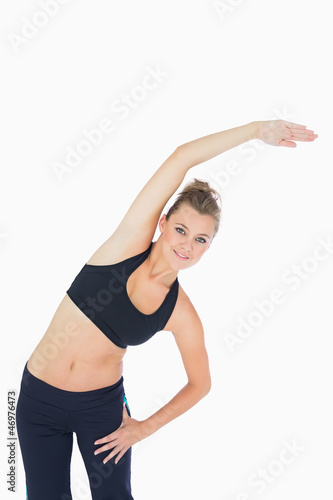 Woman leaning to the right and stretching