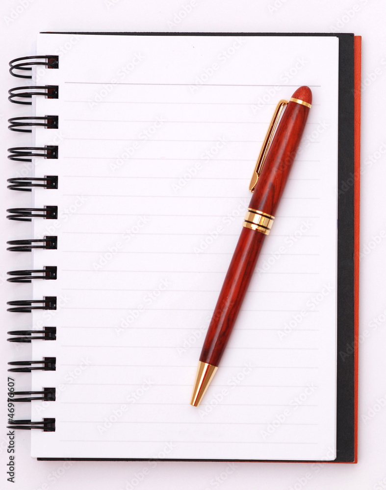 note-book and pens on white background note-book and pens on white background