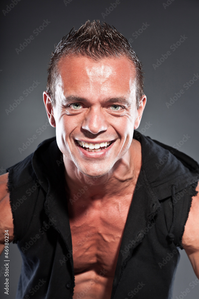 Muscled fitness man. Cool looking. Tough guy with black shirt. Muscled fitness man. Cool looking. Tough guy with black shirt.